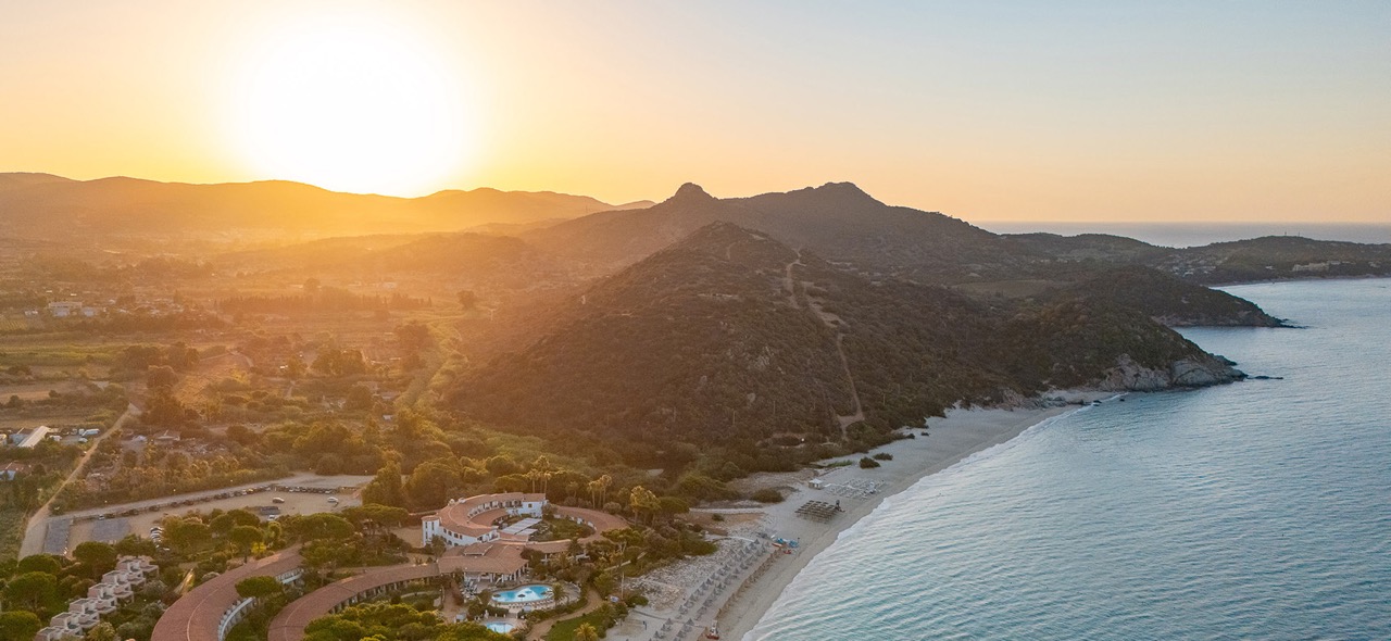 Cormoran Villasimius and the Sardinian coastline